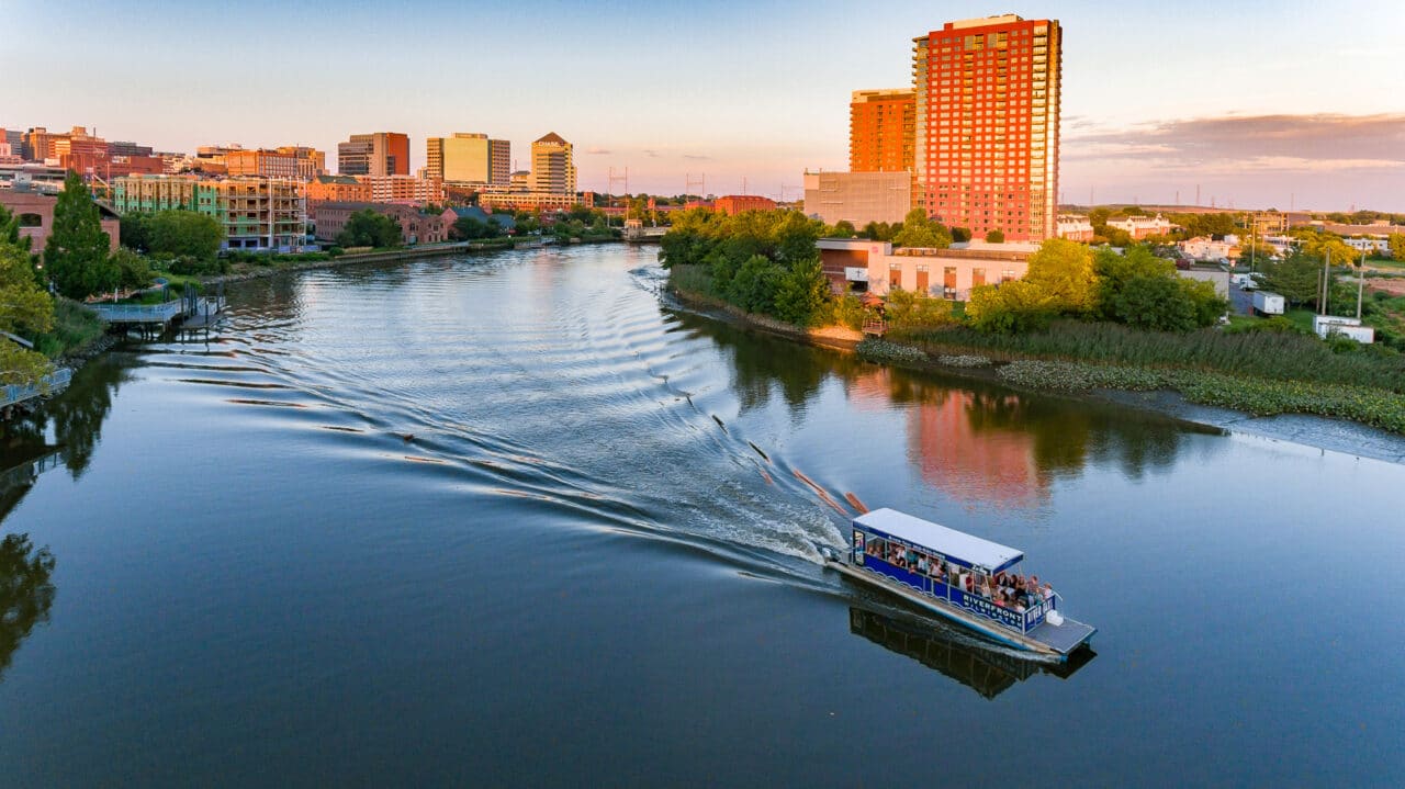 aerial view of boat cruising on river next to Apartment in Wilmington DE